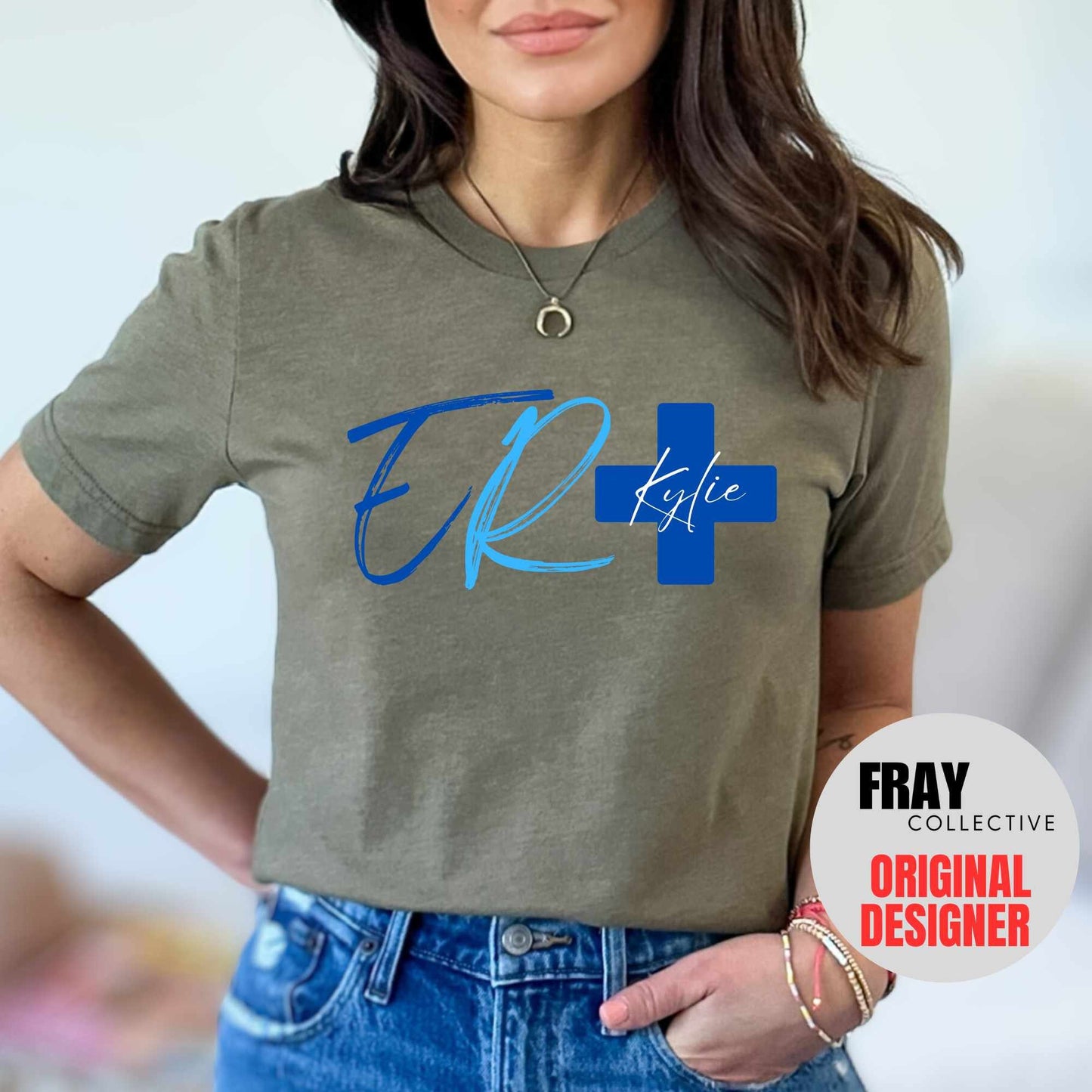 Personalized ER nurse/tech shirt—navy tee with modern ER lettering and blue cross showing custom name and credentials; great for emergency department teams.