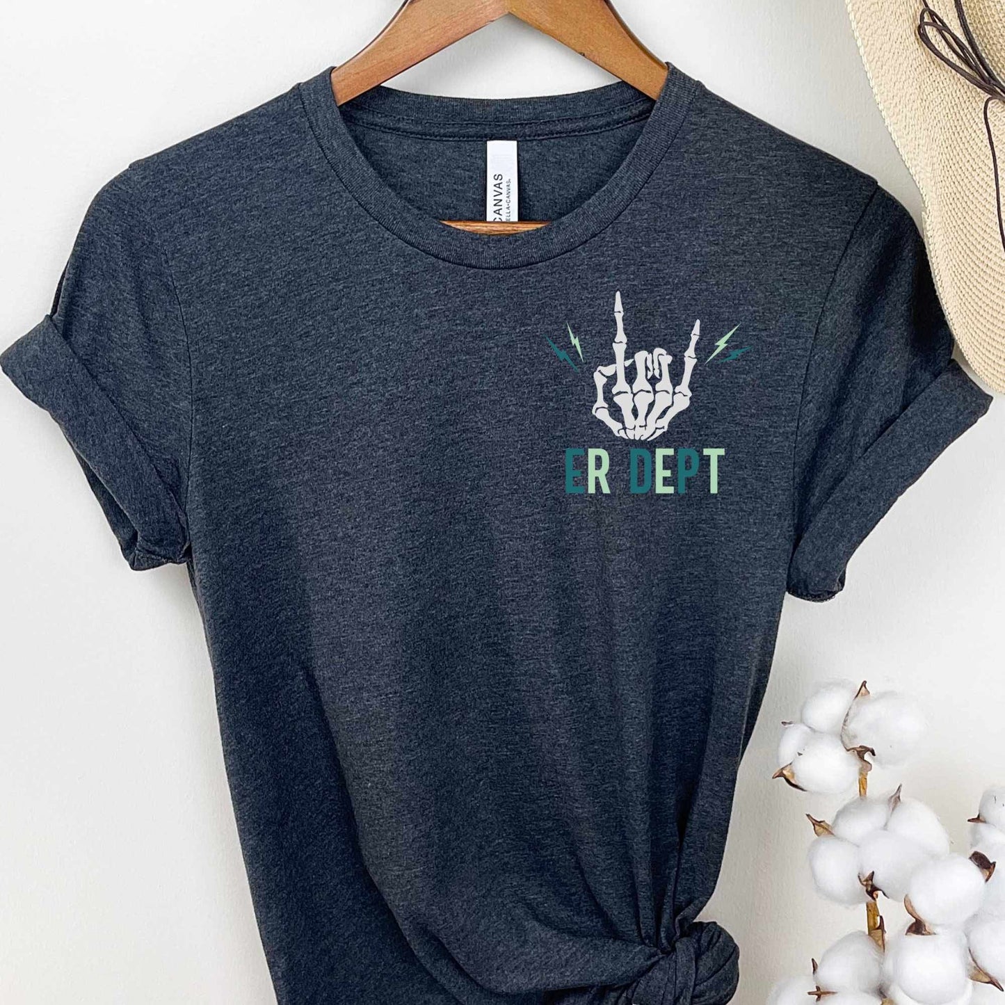 ER DEPT t-shirt with white skeleton hand and green text, minimalist chest print.