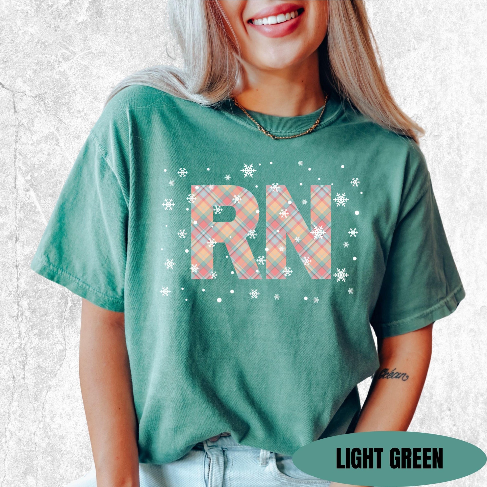 Registered Nurse Christmas Shirt | Pink Pastel Snowflake Tee for Holiday Shifts