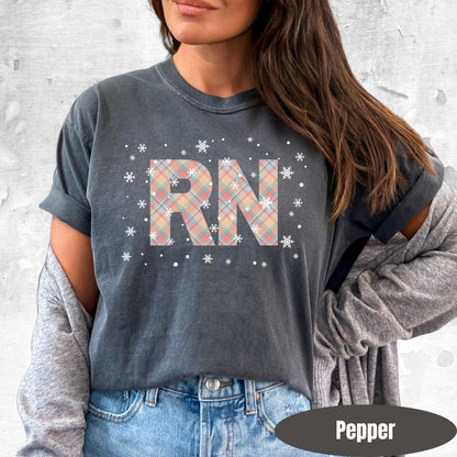 Registered Nurse Christmas Shirt | Pink Pastel Snowflake Tee for Holiday Shifts