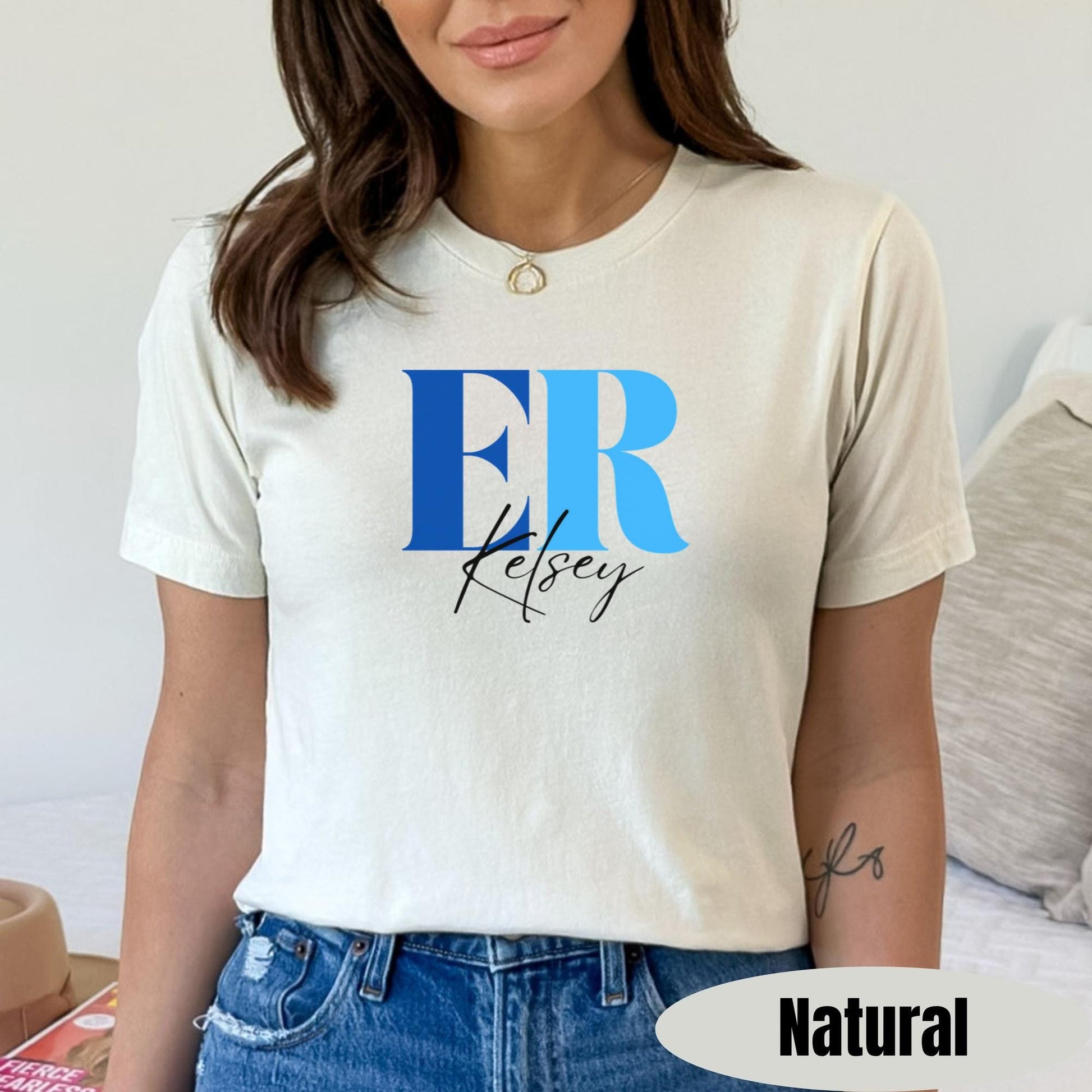 Medical professional wearing a custom ER work shirt. Personalized with  a name