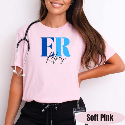 Front view of a nurse wearing a pink custom ER Nurse T-shirt. 